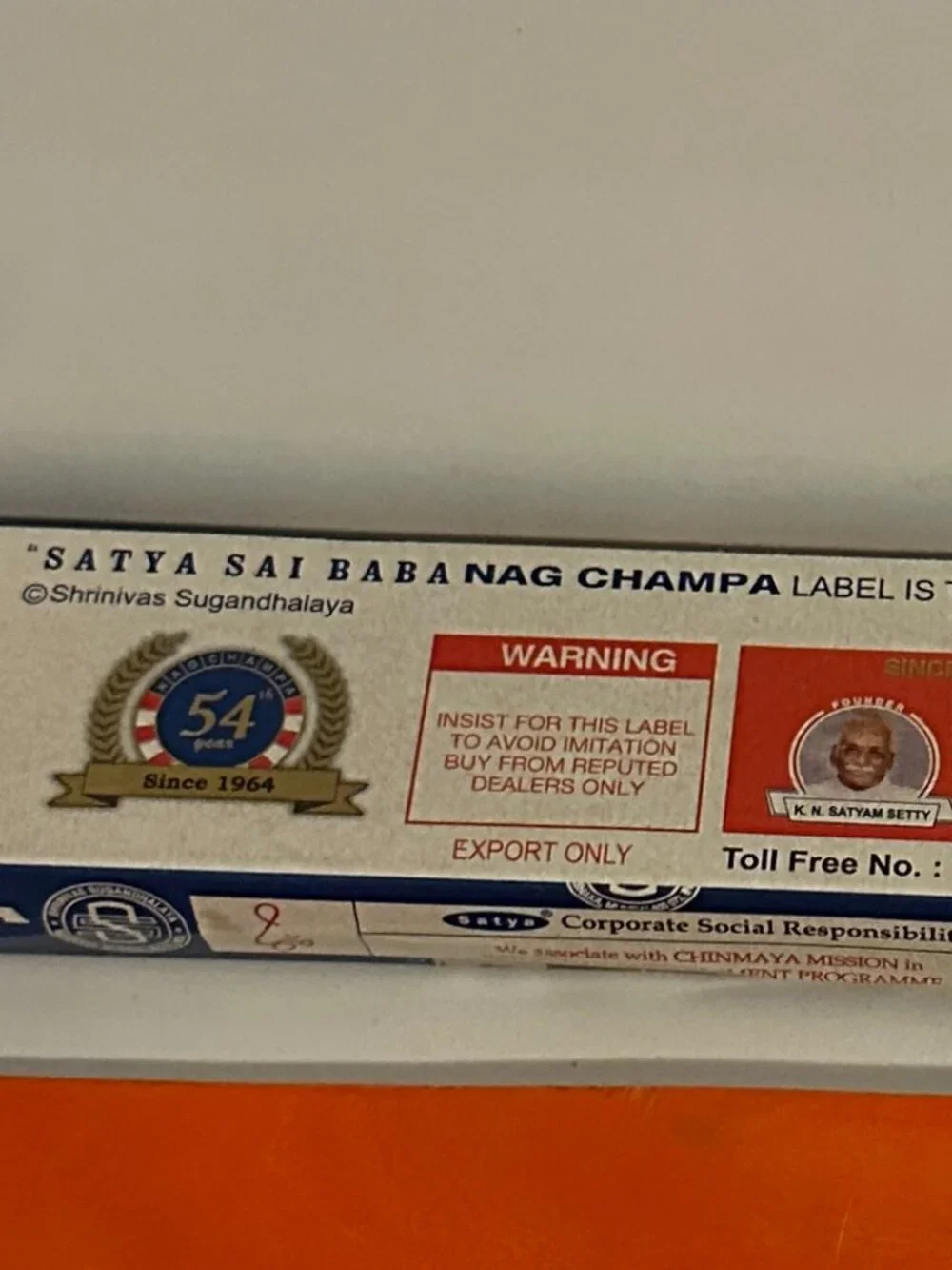 Satya Sai Baba Nag Champa Incense Sticks with Orange Om Incense Holder Set